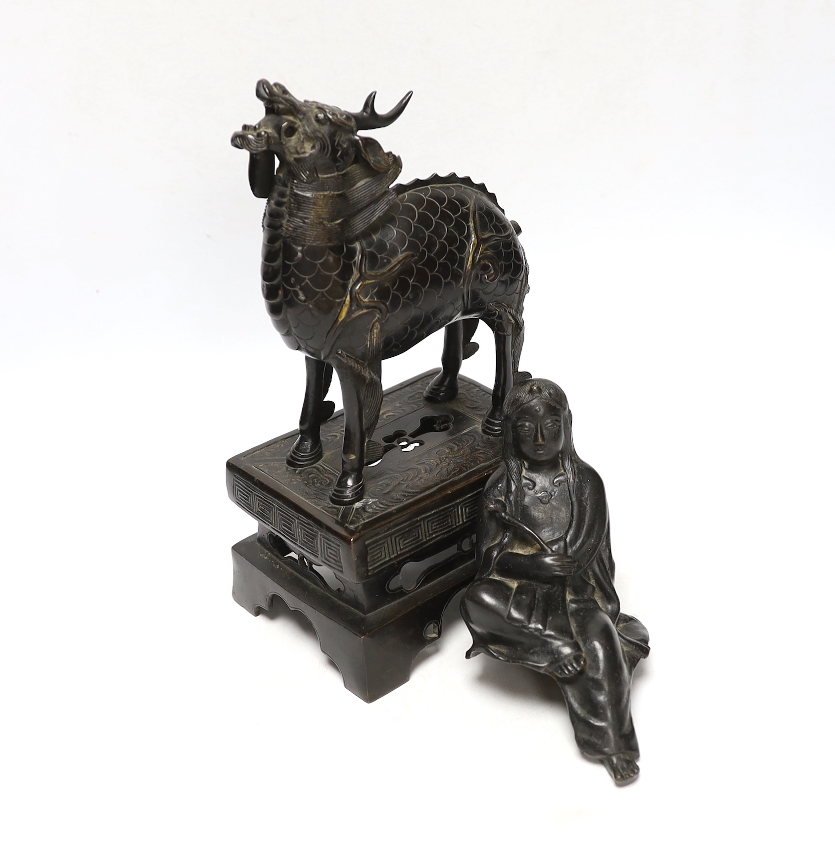 An 18th century Chinese bronze figure of a qilin together with a Japanese figural bronze mount, tallest 25cm